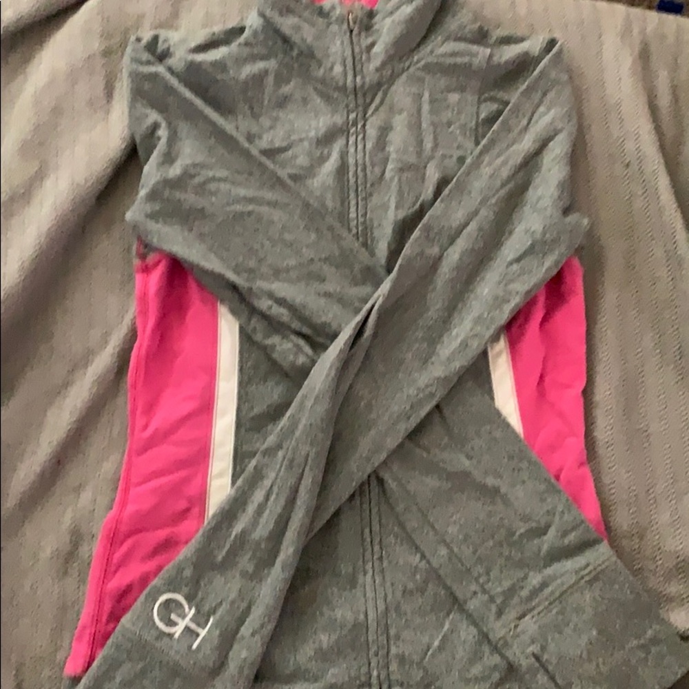Pink and a grey exercise sweater